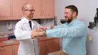 Dr. Otten with patient